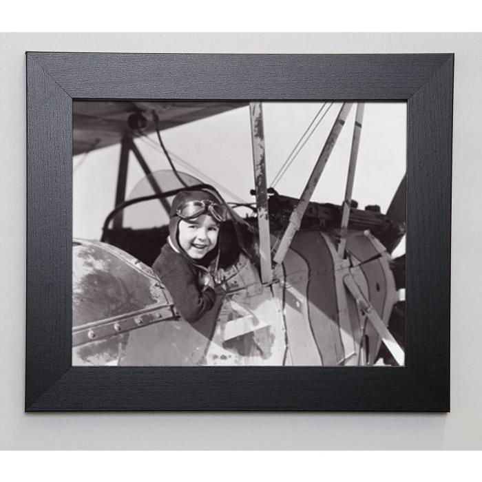 EVERETT COLLECTION Image encadrée Little boy in cockpit 31x37 cm Gris